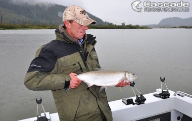 Cascade fishing adventures catches coho salmon