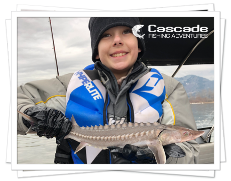 Quinn With Juvenile Sturgeon Quinn With Juvenile Sturgeon
